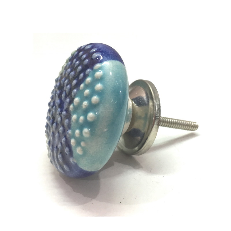 CERAMIC KNOB ROUND BLUE EMBOSSED 57 . DIAMETER 48 MM, HEIGHT 26 MM, LENGTH OF SCREW OUTSIDE KNOB 36 MM. SUPPLIED 1 SCREW ATTACHED, 1 BASE , 2 NUTS AND 1 WASHER.-1