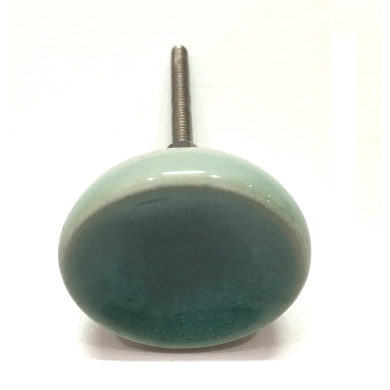 CERAMIC KNOB WATER EFFECT GREEN. DIAMETER 44 MM. HEIGHT 25 MM, LENGTH OF SCREW OUTSIDE THE KNOB 36 MM. SUPPLIED WITH 1 SCREW ATTACHED, 2 NUTS AND 1 WASHER.-1